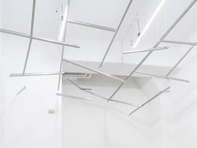 I come very briefly to this place. I watch it move. I watch it shake.*